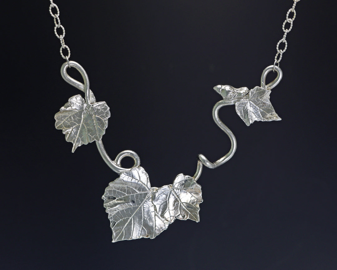 Sterling Silver Vine, leaf and bird pendant - Nell Fredericksen - Jewelry