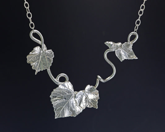 Sterling Silver Vine, leaf and bird pendant - Nell Fredericksen - Jewelry